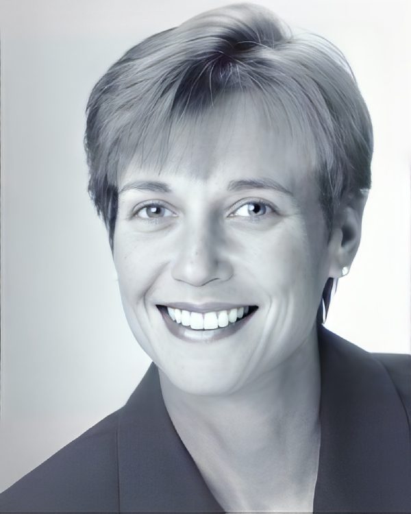 Smiling person in a professional portrait.