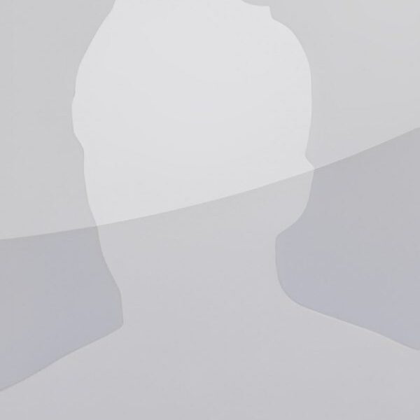 Silhouette of a person on gray background.
